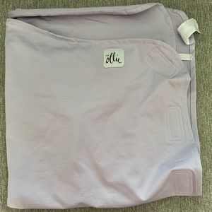 Brand new Ollie Swaddle purchased for my daughter who never used. I did wash it.
